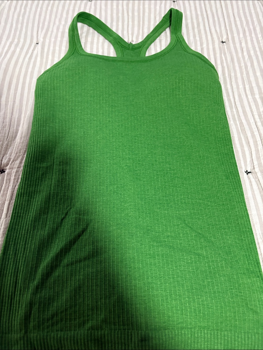 NWOT Lululemon athletica Ebb to Street tank in Chameleon. Size 4 in a B/C cup.